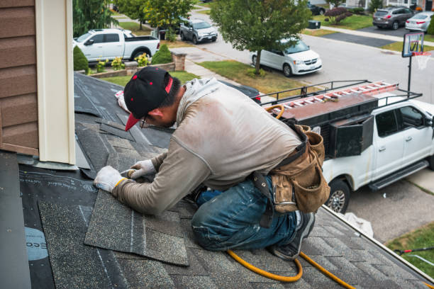 Professional Roofing technician working in Sussex, VA